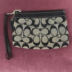 Never used black and nude Coach wristlet